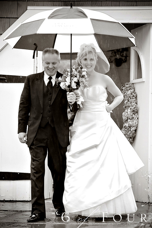 Old_Edwards_Inn_Highlands_North_Carolina_Wedding_Bride_walking_down_with_her_father_in_the_rain