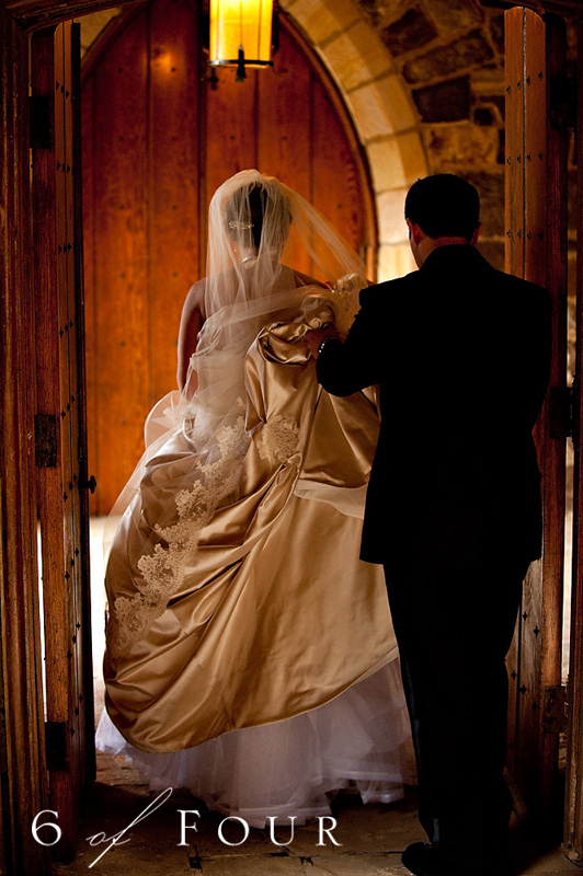 groom_carrying_brides_dress